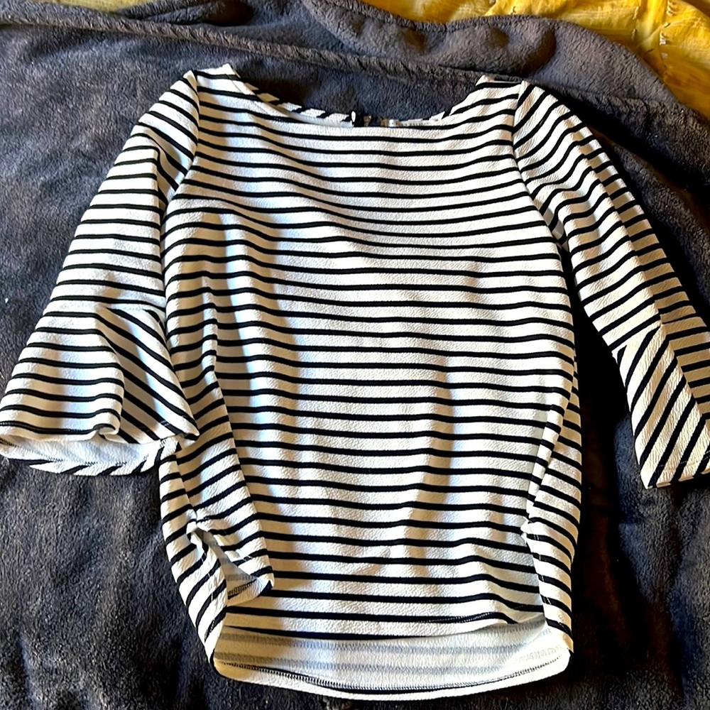 Navy blue striped top. Gently worn.